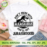 White t-shirt mockup displaying the full black vector design of 'Don't Mess With MAMASAURUS' and 'You'll Get Jurassikicked' surrounded by flowers, sandals, and jeans.