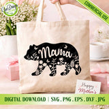 Mama Bear floral SVG design on a cream tote bag mockup with flowers and a Mother's Day card.