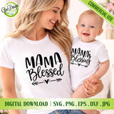 A touching lifestyle mockup of a mother and baby wearing matching white t-shirts with "MAMA BLESSED" and "MAMA'S BLESSING" SVG quotes