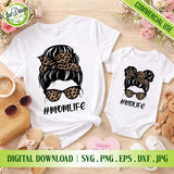 A stylish flat lay mockup showcasing white adult t-shirts and a baby onesie featuring the messy bun with leopard print sunglasses "Mom Life" and "Kid Life" designs