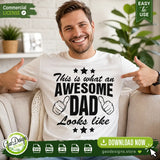 A smiling man wearing a white t-shirt featuring the 'This is what an awesome dad looks like' SVG design with thumbs up icons, perfect for Father's Day apparel and DIY Cricut projects.