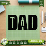 The DAD tools digital cut file displayed on a green Cricut cutting mat, demonstrating the design's compatibility for vinyl cutting enthusiasts and small business crafters using Silhouette machines.