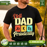 A man wearing a black Father's Day t-shirt featuring the "I Tell Dad Jokes Periodically" chemistry design in a sunny outdoor setting. This professional lifestyle mockup demonstrates how the funny science pun SVG looks when printed on apparel for dads and teachers.