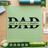 Black Dad split monogram digital design with personalized names displayed on a green cutting mat with weeding tools, ready for vinyl cutting projects.