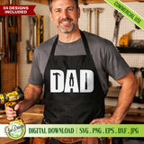 A smiling man in a workshop wearing a black apron with the Dad tools design. This shows how the SVG works perfectly for heat transfer vinyl on workwear and DIY workshop gifts.