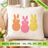 Decorative pillow with colorful bunny designs on a couch