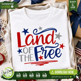 A white t-shirt featuring the Land of the Free SVG patriotic design folded inside a kraft gift box. The image showcases the digital design's real-life application for Independence Day apparel and includes a commercial license badge.