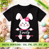 Mockup of a black kids t-shirt with a personalized Easter Bunny split monogram SVG cut file, named Emily with a pink frame and flower, surrounded by eggs - GaoDesigns