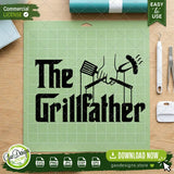 The Grillfather SVG design displayed on a green vinyl cutting mat with weeding tools, highlighting its compatibility with Cricut and Silhouette machines for DIY craft projects.